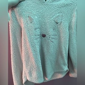 Pink cat face jacket has sequins as the face no pockets fuzzy